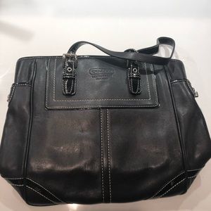 Black Coach tote with patent leather straps